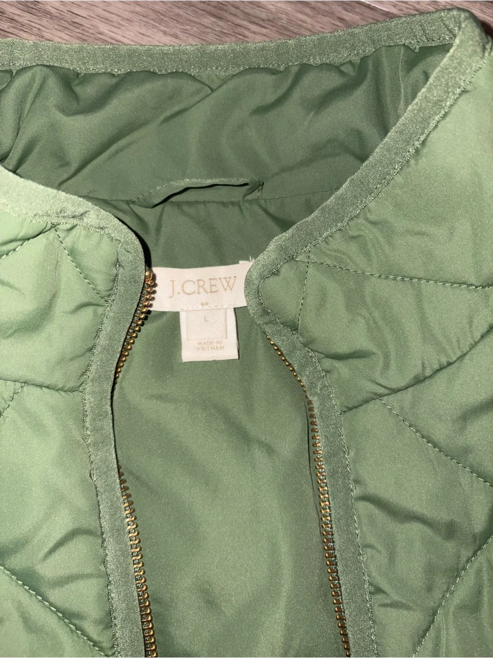 J.Crew Quilted Puffer Vest in olive green, size Large.